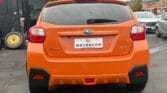 back view of orange 2013 Subaru XV