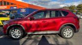 full side view of red 2012 Mazda CX-5