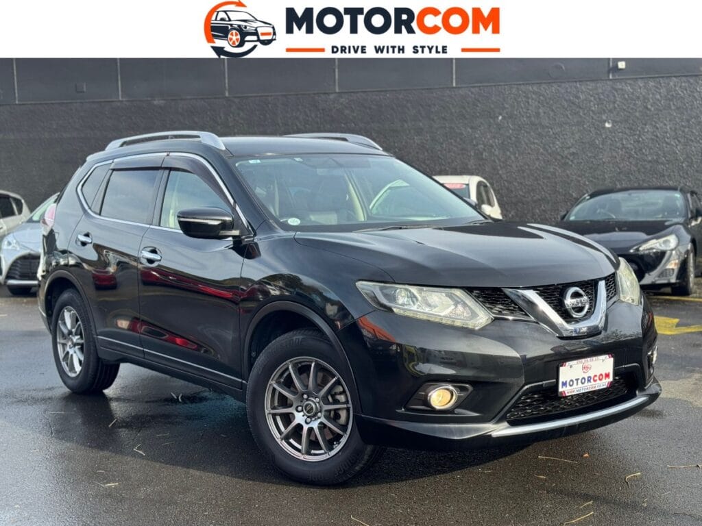 front side view of black 2014 Nissan X-Trail