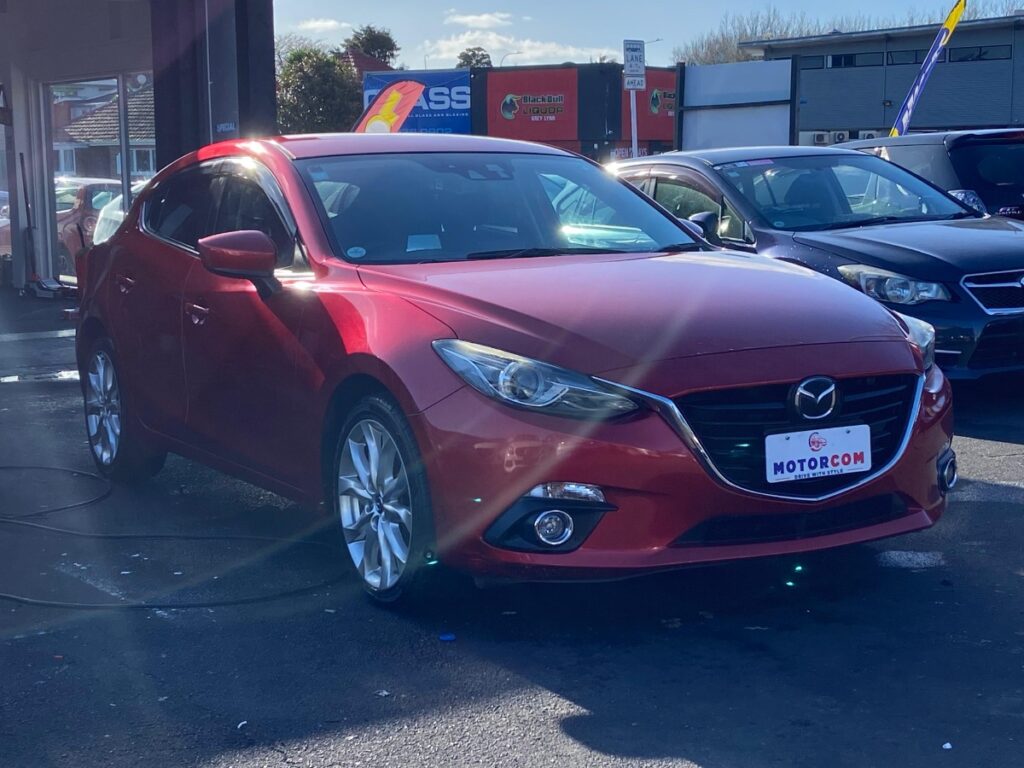 side view of 2015 Mazda Axela