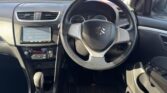 steering wheel and front seat view of 2014 Suzuki Swift