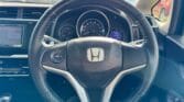 steering wheel view of 2014 Honda Fit