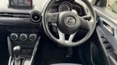 steering wheel view of luxury 2014 Mazda Demio