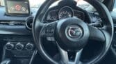 steering wheel view of 2016 Mazda Demio 13S