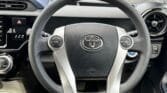 steering wheel view of 2016 Toyota Aqua