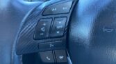 steering wheel closeup view of 2015 Mazda Axela