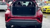 open trunk view of red 2017 Toyota C-HR G