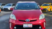 front view of red luxury 2013 Toyota Prius