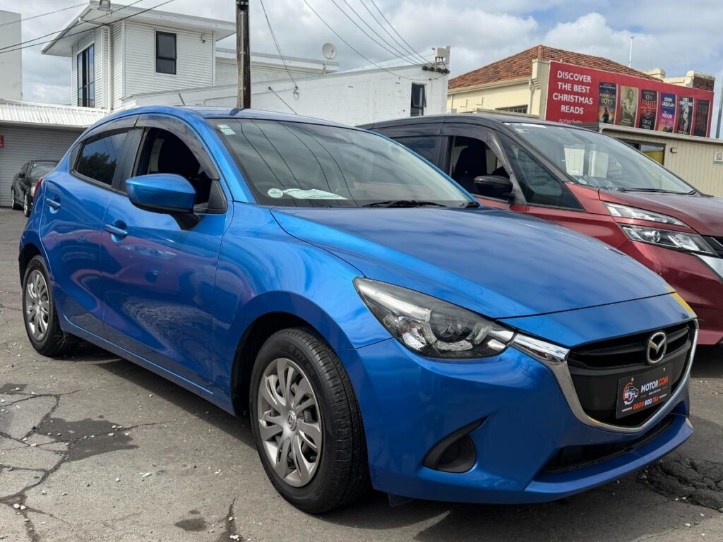 front side view of 2014 Mazda Demio