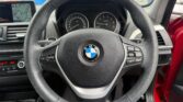 steering wheel view of 2015 BMW 116i 1