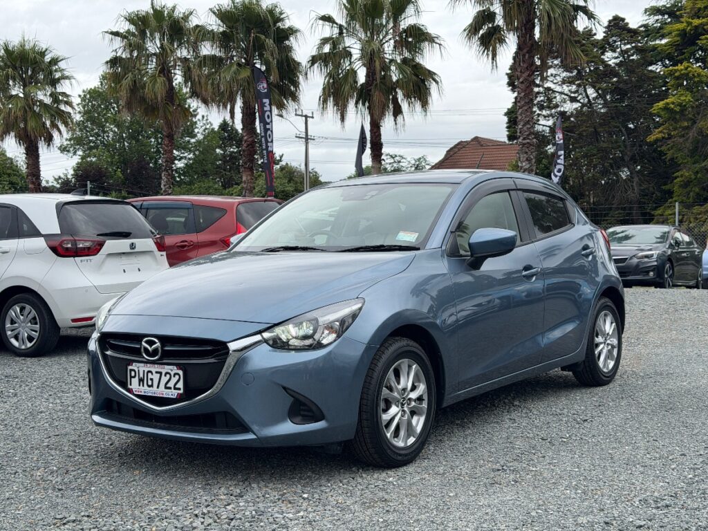 side view of 2015 Mazda Demio