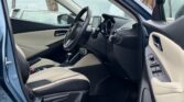front door open view of 2015 Mazda Demio