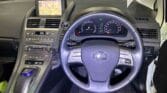 2012 Lexus HS250H steering wheel and front seats view