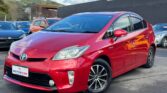 front side view of red used 2013 Toyota Prius in nz