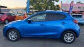 full side view of 2015 Mazda Demio