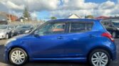 full side view of 2014 Suzuki Swift