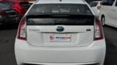 back side view of a white 2014 Toyota Prius