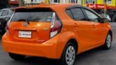 2016 Toyota Aqua S orange back side view
