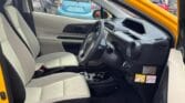 front door open interior view of yellow 2014 Toyota Aqua S