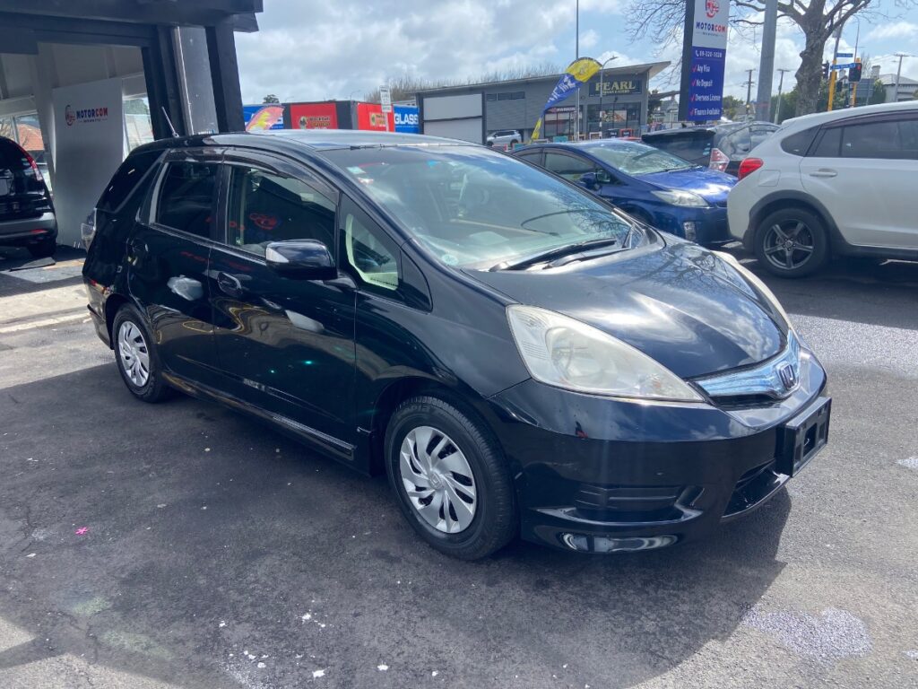 side view of 2012 Honda Shuttle