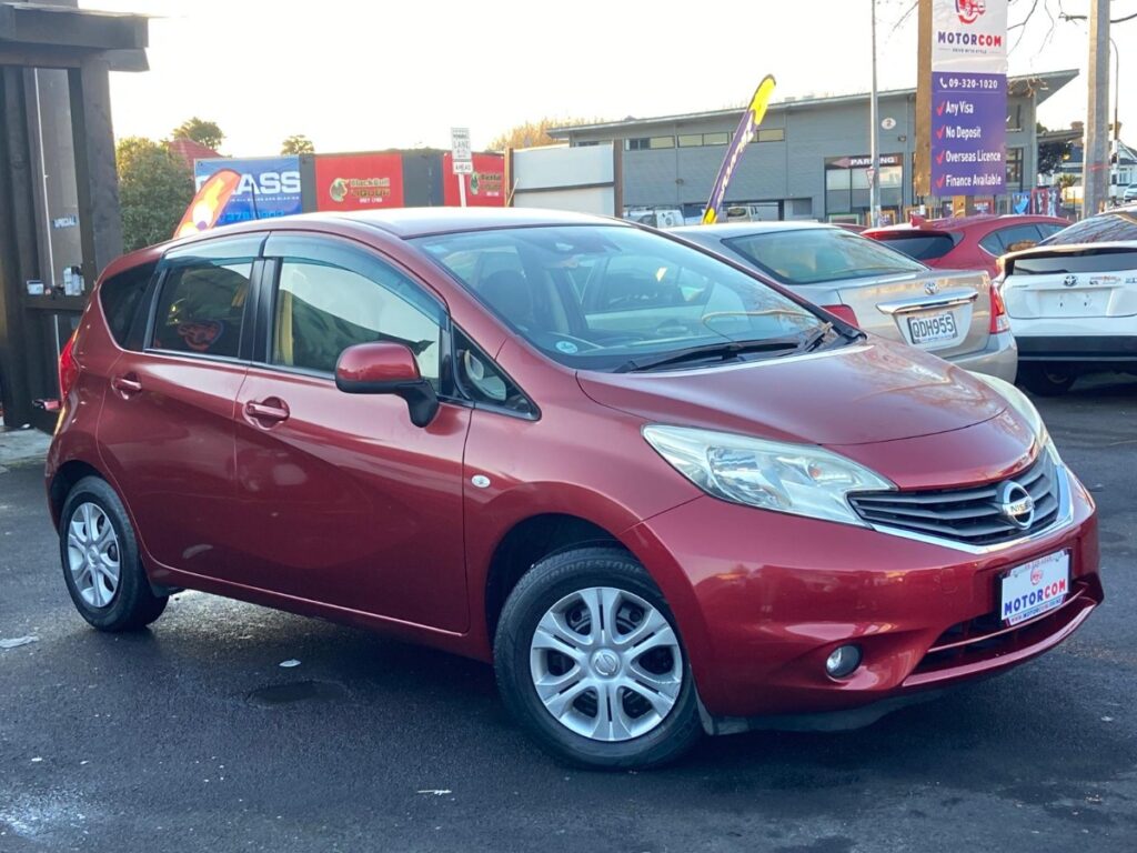 front side view of red 2014 Nissan Note X