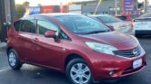 front side view of red 2014 Nissan Note X