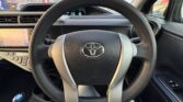 steering wheel view of 2014 Toyota Aqua
