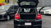 open trunk view of black 2020 Suzuki Swift
