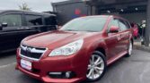 front side view of red used 2013 Toyota Prius 5D S