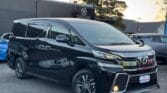front side view of black 2016 Toyota Vellfire
