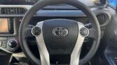 steering wheel view of 2015 Toyota Aqua