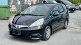 side view of 2012 Honda Shuttle