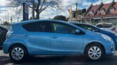 full side view of 2015 Toyota Aqua