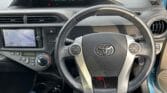 steering wheel view of 2012 Toyota Aqua