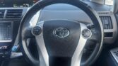 steering wheel view of 2013 Toyota Prius Alpha