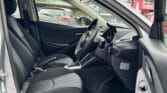 front door open view of 2014 Mazda Demio