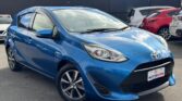 front side view of used blue 2017 Toyota Aqua