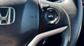 steering wheel closeup view of 2013 Honda Fit HYBRID