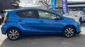 blue 2017 Toyota Aqua full side view