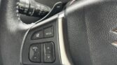 steering wheel closeup view of 2014 Suzuki Swift