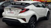 back side view of pearl white 2017 Toyota C-HR G