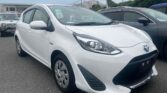 front side view of white 2020 Toyota Aqua