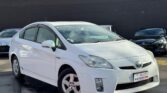 front side view of white 2010 Toyota Prius