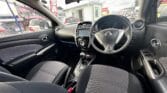 front seats view of white 2015 Nissan Latio