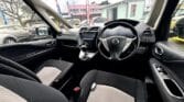 front seats view of black 2013 Nissan Serena