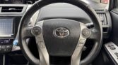 steering wheel view of 2014 Toyota Prius Alpha
