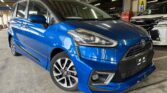 front side view of blue 2017 Toyota Sienta