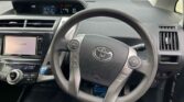 steering wheel view of 2015 Toyota Prius Alpha