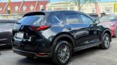 full side view of used 2015 Nissan X-Trail