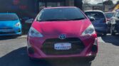front view of pink 2016 Toyota Aqua G